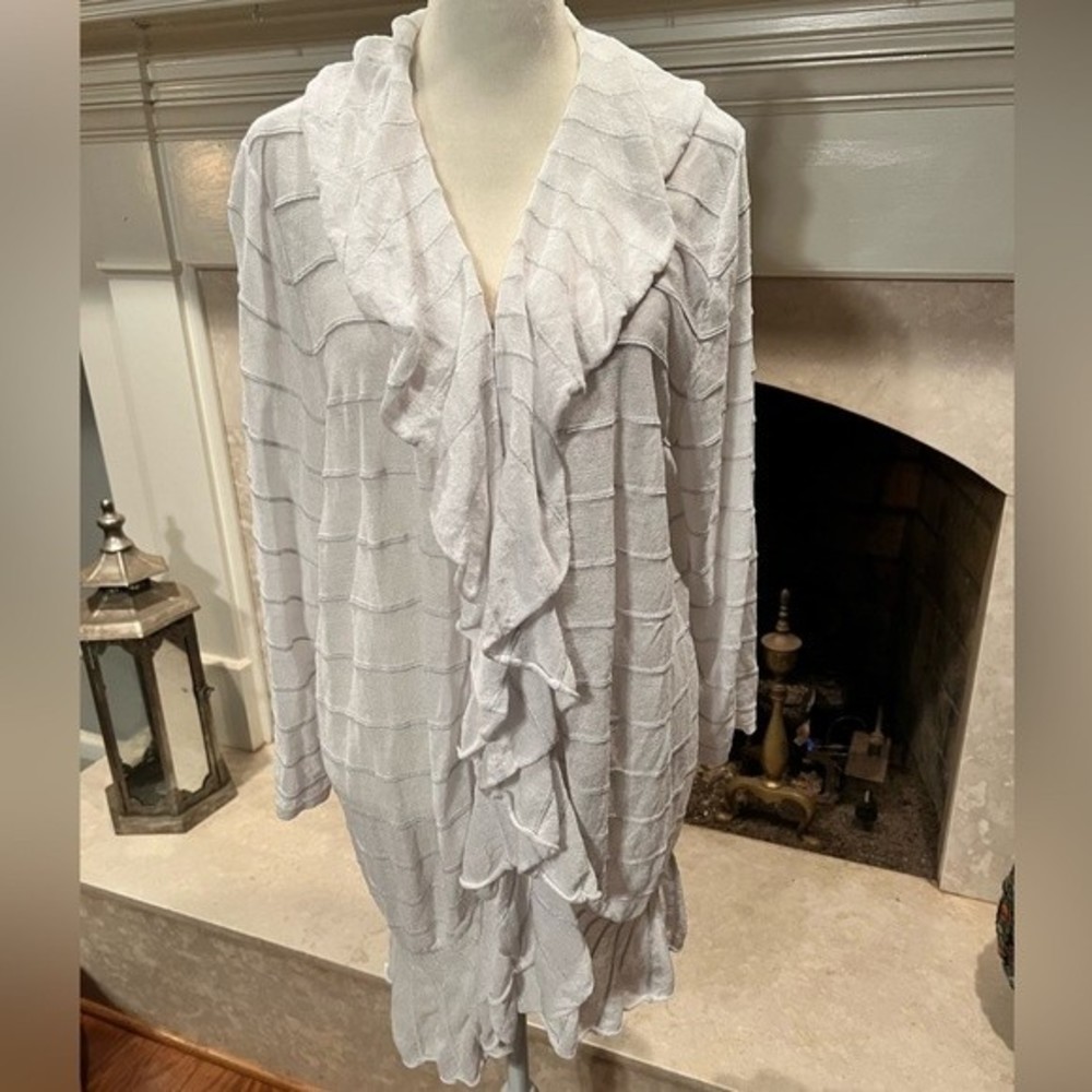 Chico’s very lightweight ruffled cardigan. Chicos size 4/ XXL or 20 / 22